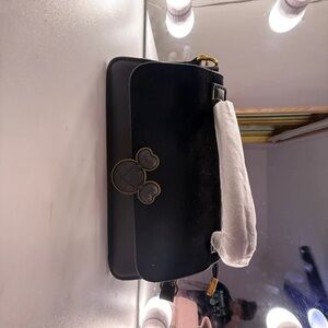 Chic Black Wristlet with Iconic Design